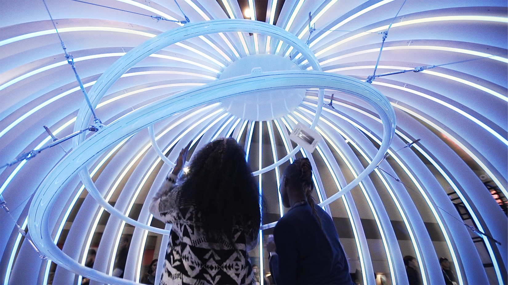installation for Samsung of a lit orb with a camera on a spiral roller coaster